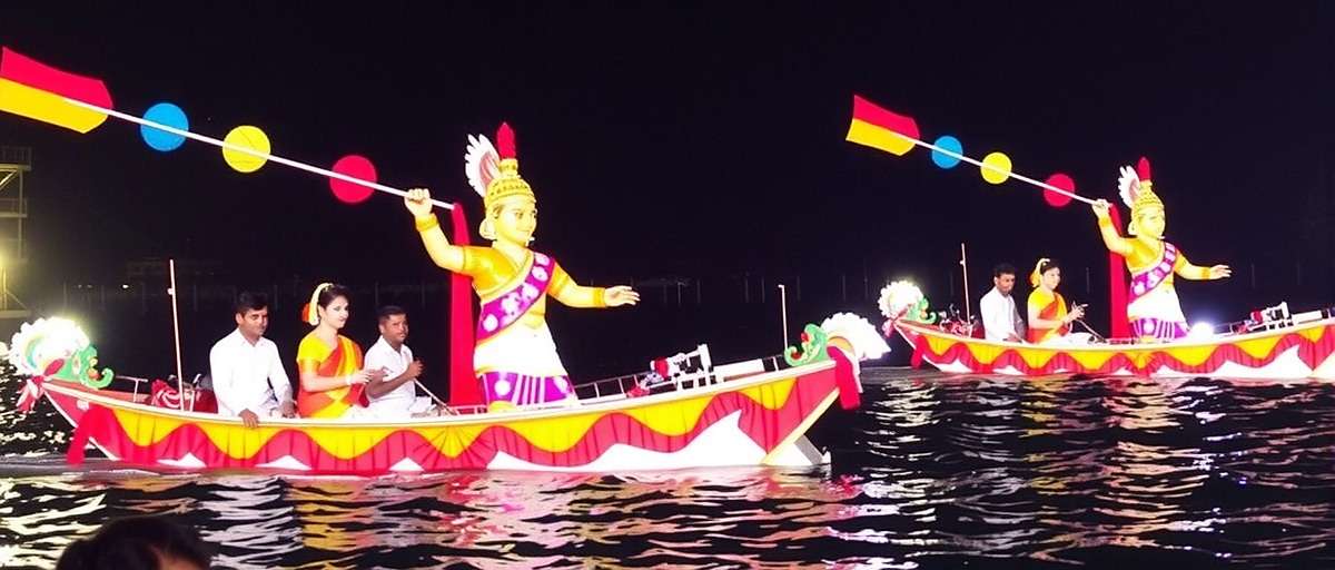 Hussain Sagar Strikers Festival Event Hussain Sagar Strikers festival event showing decorated boats racing during Bathukamma celebrations